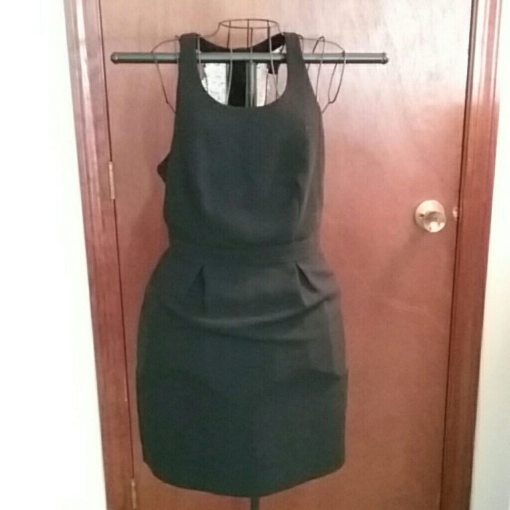 Lined black dress with lace back.