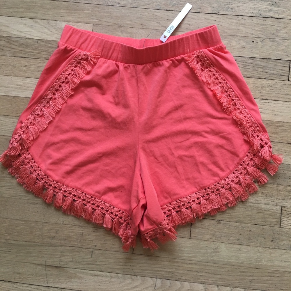 Peach colored tasseled asos shorts