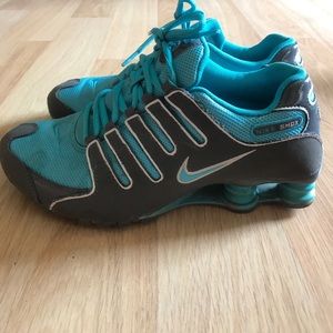 Blue and grey Nike shox.