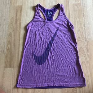 Purple Nike tank top.
