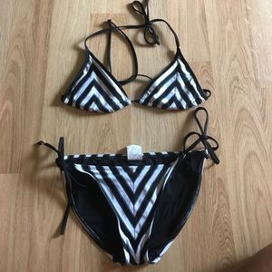 Swimsuit. Black and white stripes.