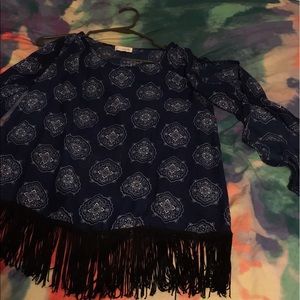 Shear blue fringe top with open sleeve detail