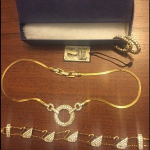 Swarovski earrings, necklace, and bracelet.