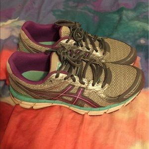 Teal and purple asics tennis shoes