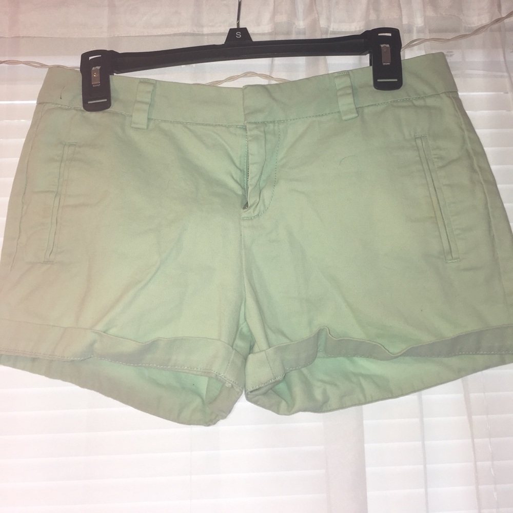 Light greenish shorts
