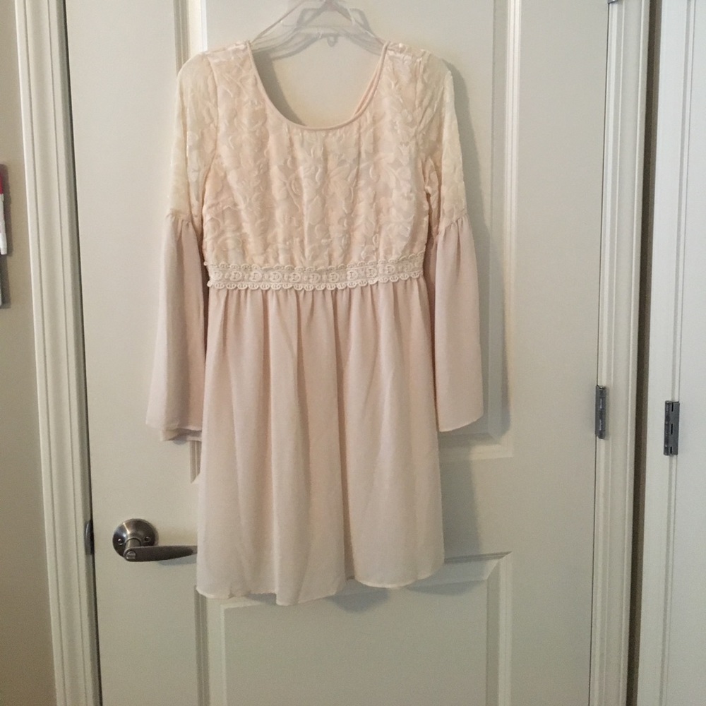 Cream colored long sleeve dress