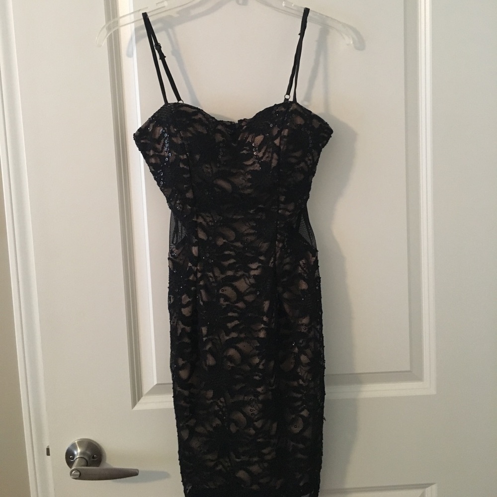 Tight Black and Tan dress with sheer cutouts