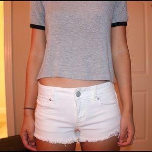 Low waisted white cut-off shorts