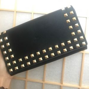 Black studded Aldo clutch