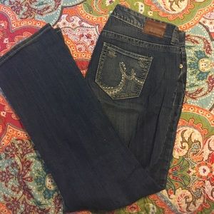 Medium wash Maurice's jeans. 16