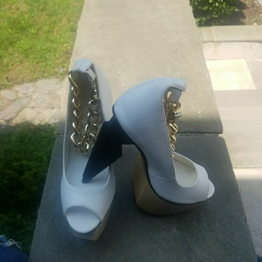 Brand New white high heels.