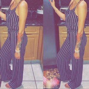 Black and white stripped jumpsuit. Full length.