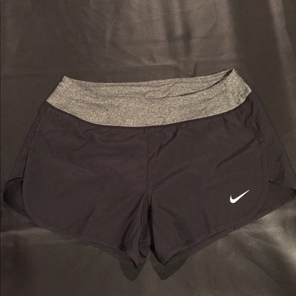 NWOT Nike running shorts (medium)