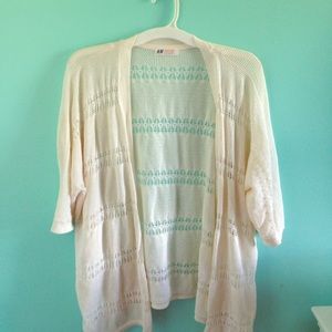 A cream colored sweater by H&M