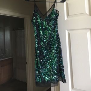 Green and black sequined mini dress
