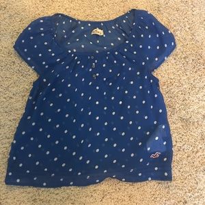 Royal blue top with white polka dots