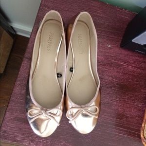 Rose gold ballet flats