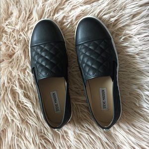 Steve Madden black slip ons