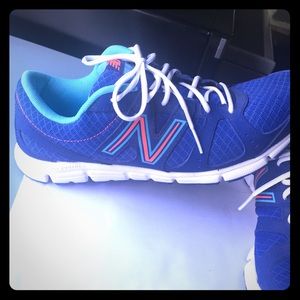 New Balance sneakers.