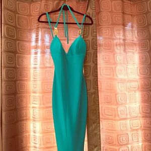 Emerald green with gold buckles