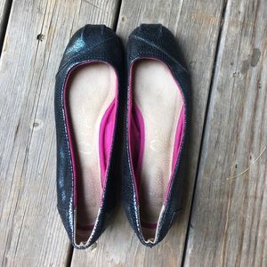 Black Toms ballet flats.