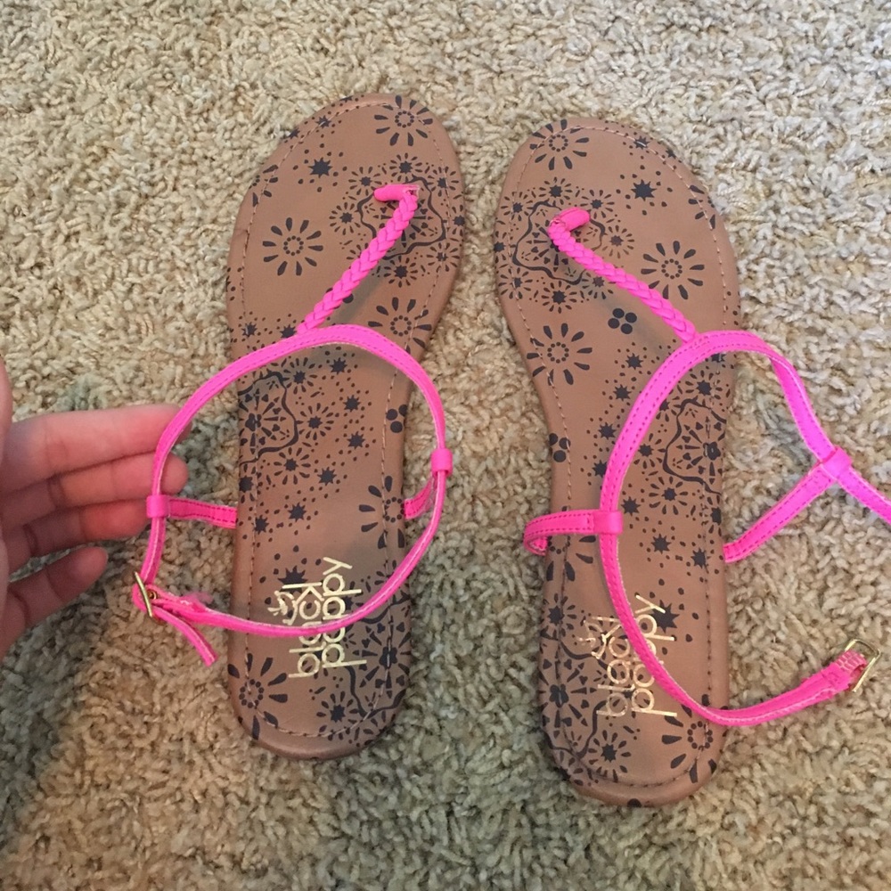 Neon pink strapped sandals