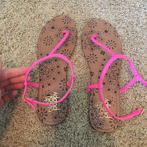 Neon pink strapped sandals