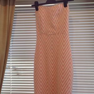 Strapless striped dress in peach