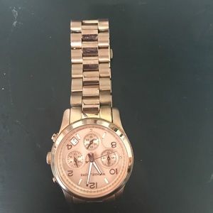 Rose gold Michael Kors watch in original box.