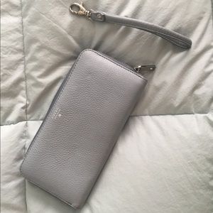 Fossil light blue wallet with wristlets attachment