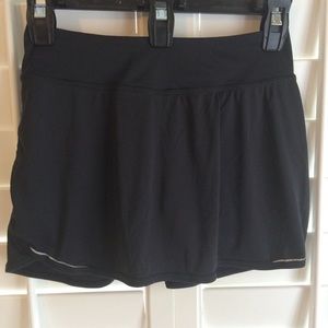 black / neon pink exercise skirt / shorts