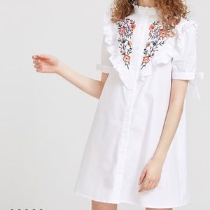 White peasant dress with ruffles. NWOT
