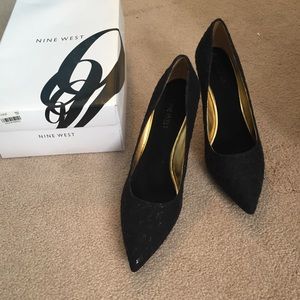 Nine West Black and gold shoes.