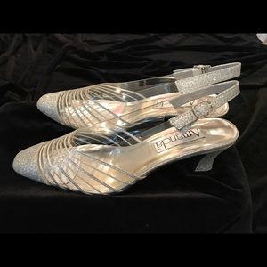 Silver and clear sling backs