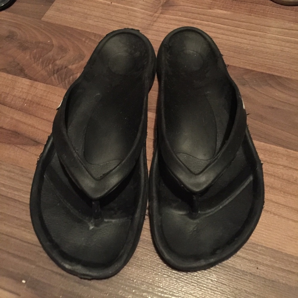 Black rubber croc like sandals