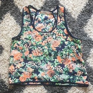Cute colorful top with open back.