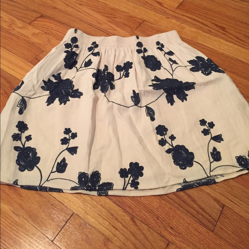 Cream with blue flowers