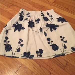 Cream with blue flowers