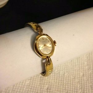 Vintage 1960s Timex gold watch w/adjustable band