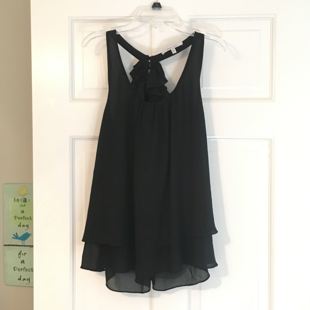 Black naked zebra ruffle back top