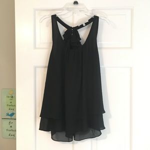 Black naked zebra ruffle back top