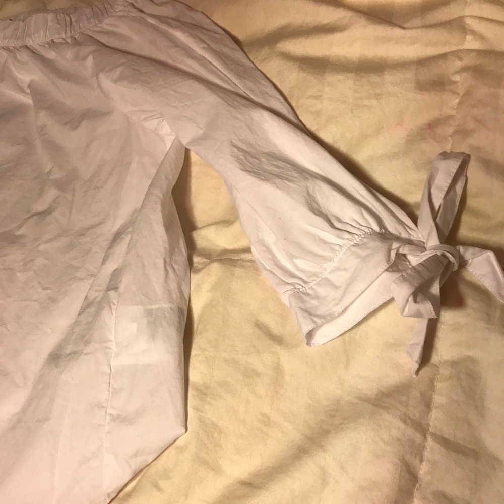 H&M White off the shoulder top with bow ties