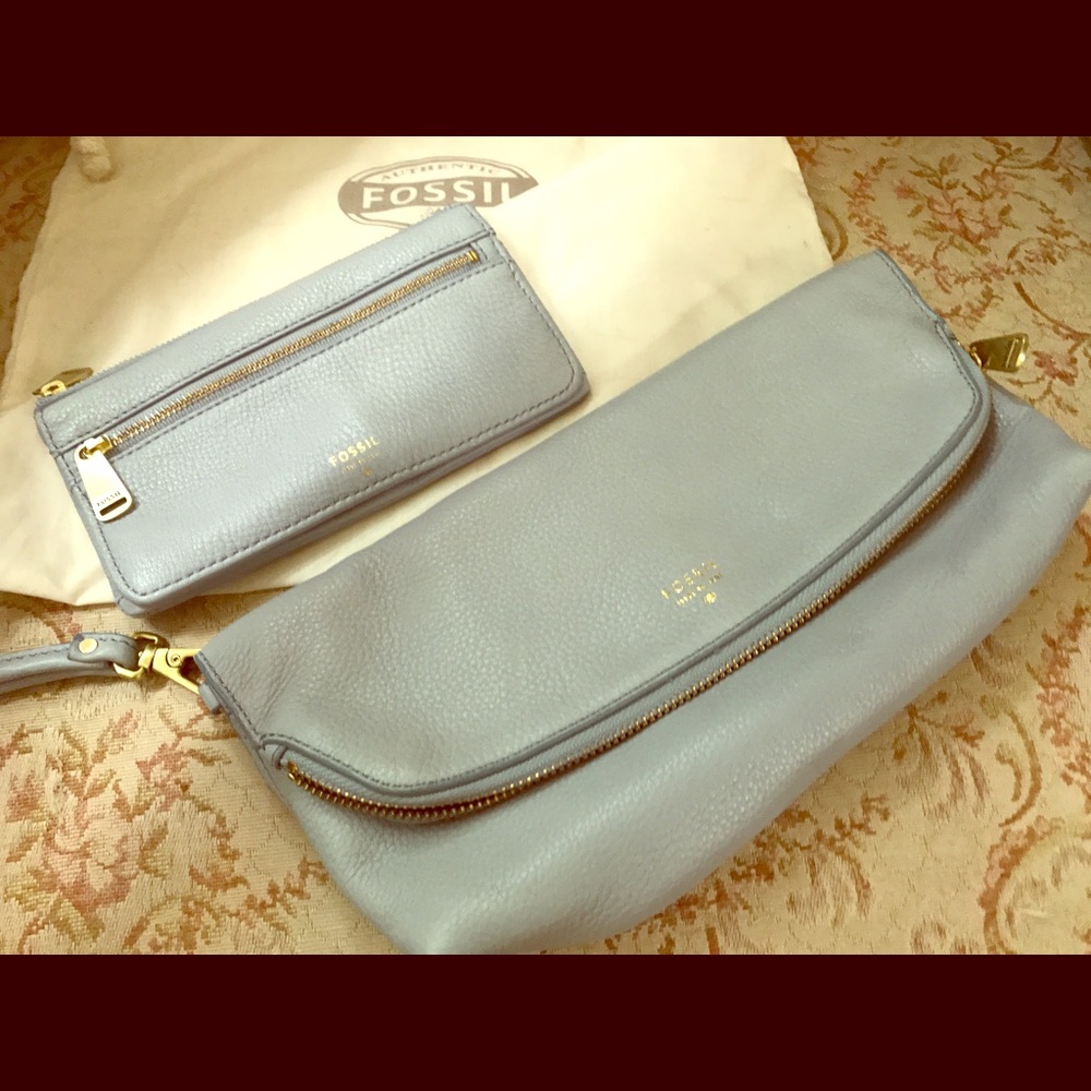 This bundle of 2. Fossil purse and matching wallet