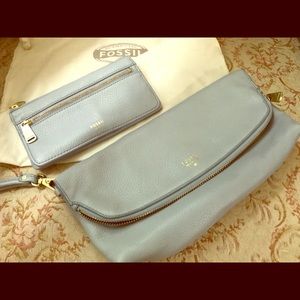 This bundle of 2. Fossil purse and matching wallet