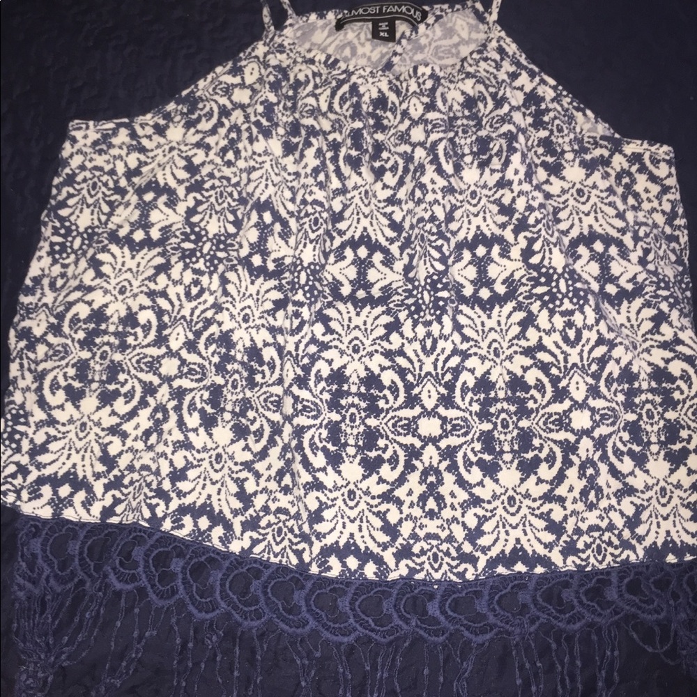 Only worn a few times. It's XL but fits like Med.