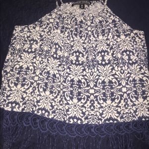 Only worn a few times. It's XL but fits like Med.