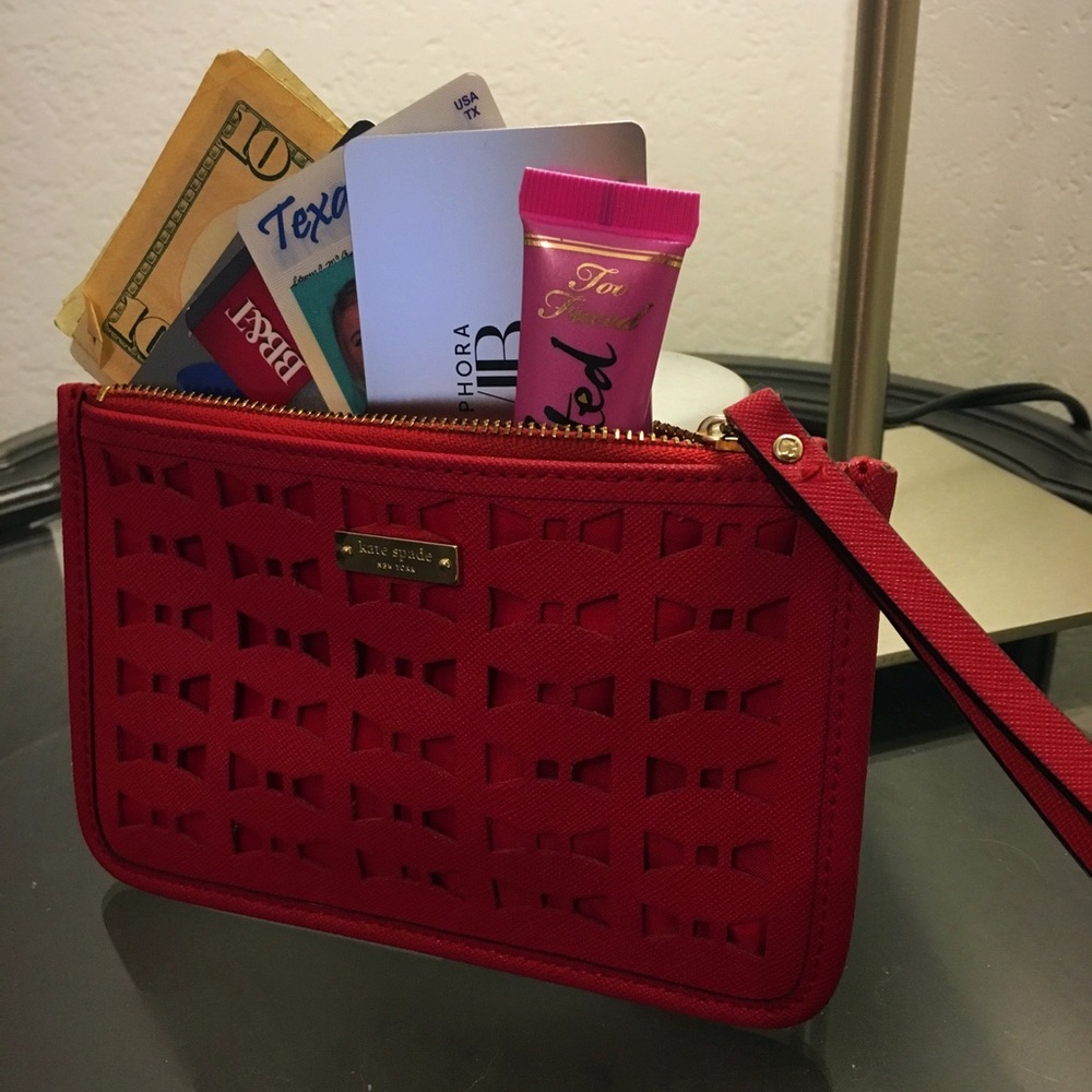 Red Kate spade bow wristlet