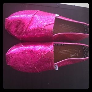 TOMS glitter fuschia youth slip on