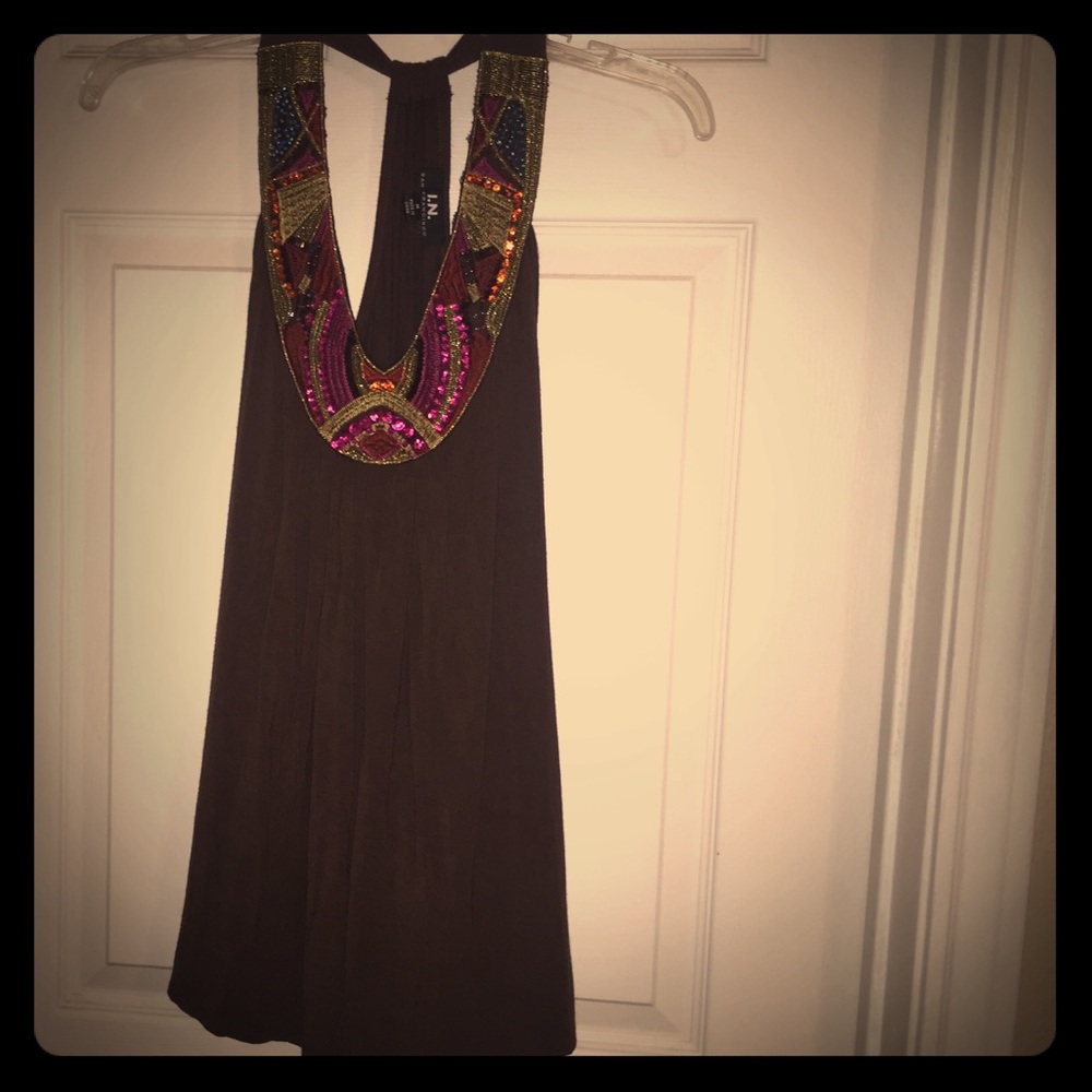 Beaded neckline tank top.