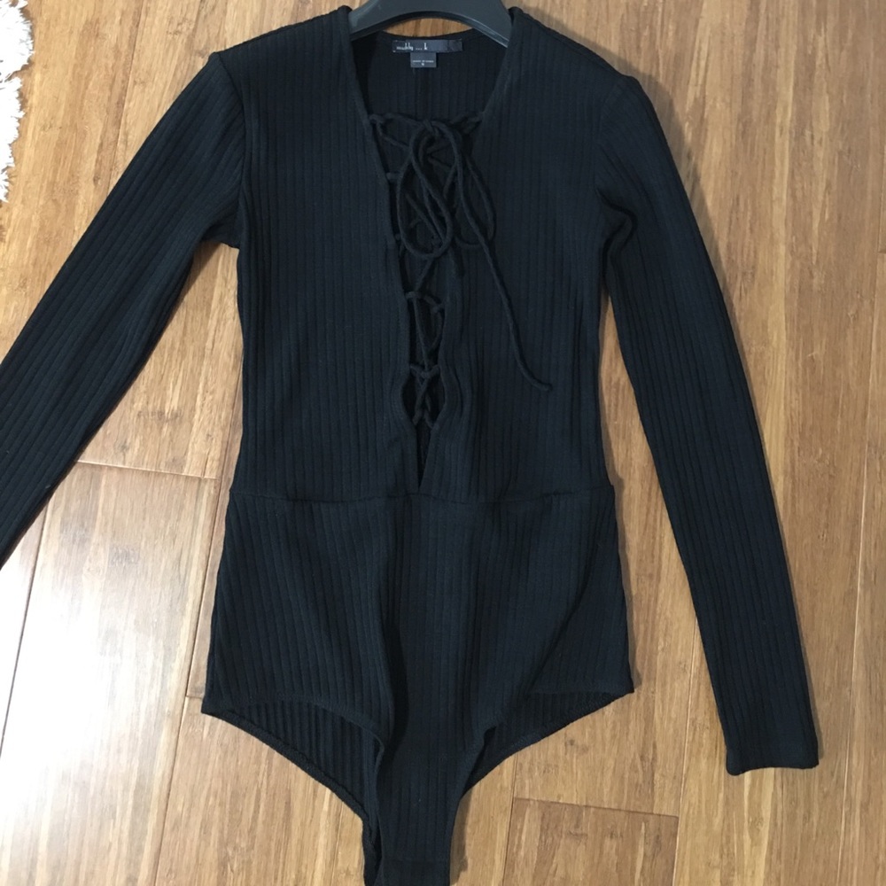 Laceup deep v neck bodysuit. Size S